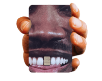 a person holding up a cell phone with a picture of a man's mouth